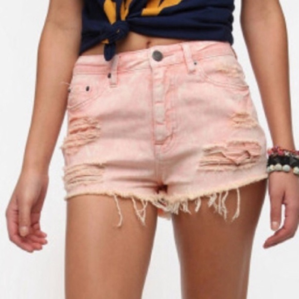 Pink cheeky denim shorts